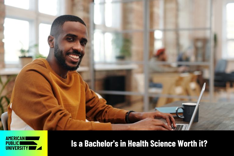 is-a-bachelors-in-health-science-worth-it health science student at computer