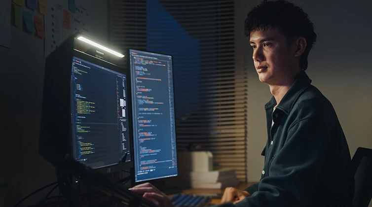 Man looking at his computer