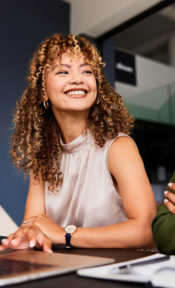 Woman smiling at colleague