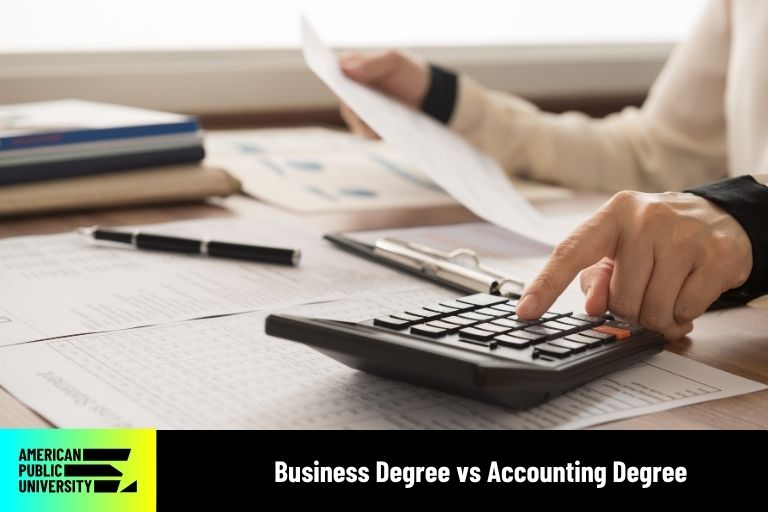 accountant working on calculator