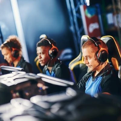 Players gaming with headsets on