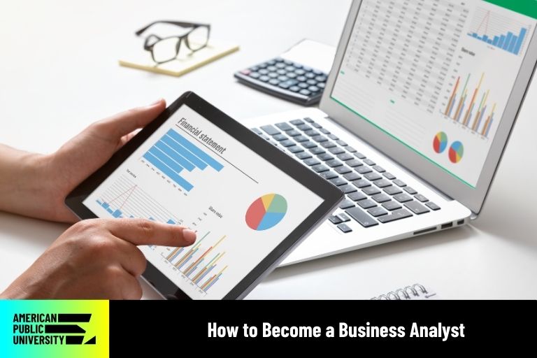 business analyst looking at data on tablet