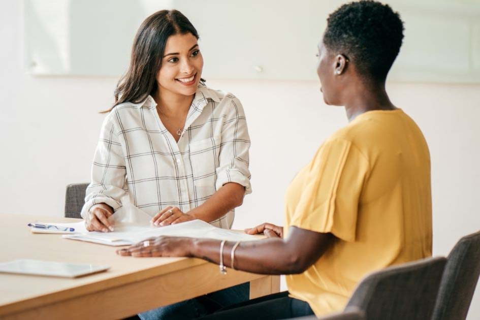 finance professional working with client