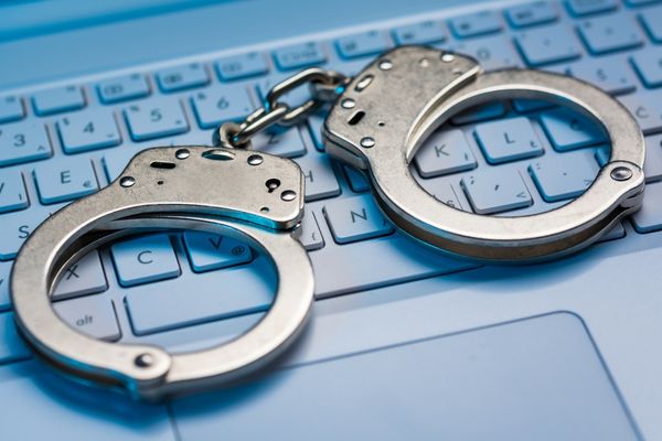 handcuffs on keyboard