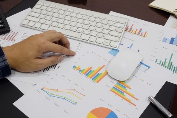 supply chain management professional looking at data
