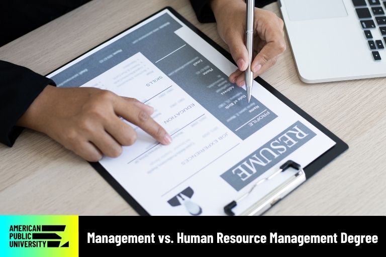 human resource professional looking at resume